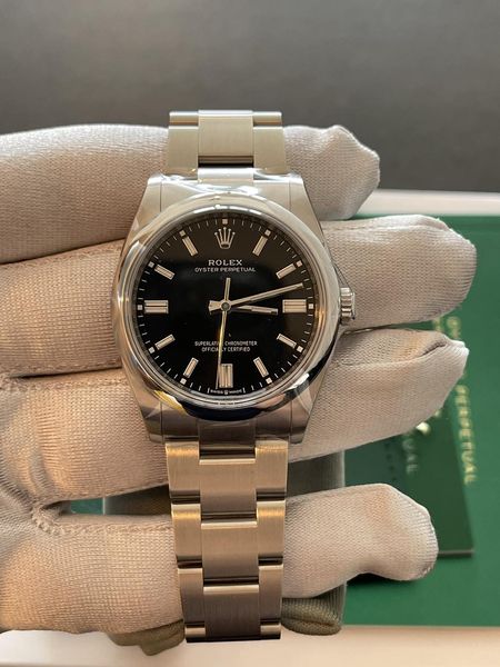 ROLEX OYSTER PERPETUAL 126000-0002